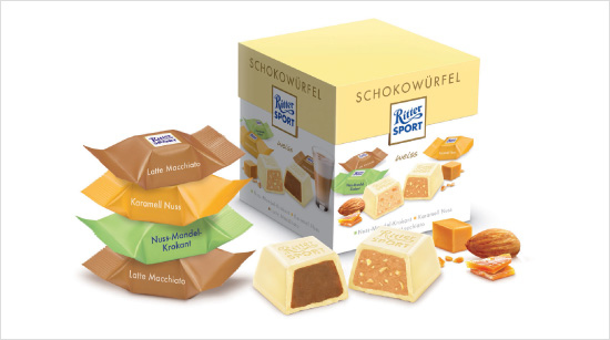 Ritter Sport bietet seine beliebte Schokowürfelbox jetzt auch mit drei neuen, leckeren Sorten in weißer Schokolade an.