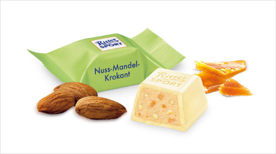 Haselnusscreme mit knusprigen Nuss- und Mandelkrokant-Stückchen in weißer Schokolade: Die Sorte Nuss-Mandel-Krokant macht das Schokowürfel-Vergnügen komplett.