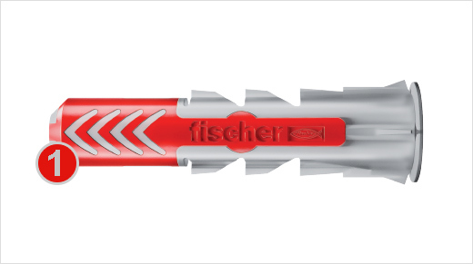 Sa matière souple (rouge) assure une fixation solide et fiable dans les matériaux pleins. 